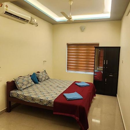 Punerjeni Homes Alappuzha Luaran gambar