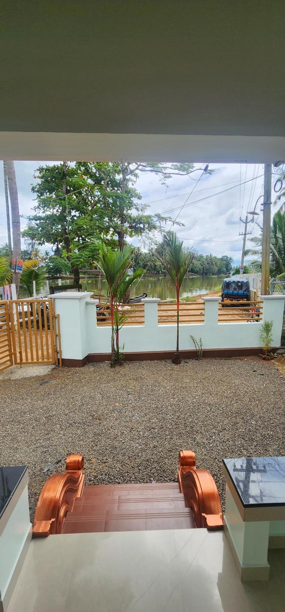 Punerjeni Homes Alappuzha Luaran gambar